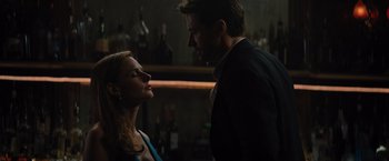 Movie still from “Reminiscence” (2021), directed by Lisa Joy – A man and a woman standing next to each other; Close Up shot, Low angle