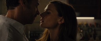 Movie still from “Reminiscence” (2021), directed by Lisa Joy – A man and a woman face to face in the dark; Close Up shot, Low angle