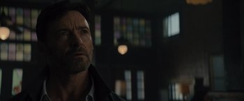 Movie still from “Reminiscence” (2021), directed by Lisa Joy – A person looking at the camera; Close Up shot, Low angle