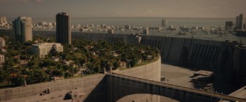 Movie still from “Reminiscence” (2021), directed by Lisa Joy – An aerial view of a city and a bridge; Extreme Wide shot, High angle