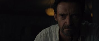 Movie still from “Reminiscence” (2021), directed by Lisa Joy – A person with a white shirt; Close Up shot, Low angle