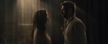 Movie still from “Reminiscence” (2021), directed by Lisa Joy – A man and a woman standing next to each other; Close Up shot, Low angle