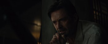 Movie still from “Reminiscence” (2021), directed by Lisa Joy – A person smoking a cigarette; Close Up shot, Low angle