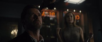 Movie still from “Reminiscence” (2021), directed by Lisa Joy – A man and a woman in a dark room; Close Up shot, Low angle