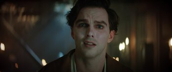 Movie still from “Renfield” (2023), directed by Chris McKay – A person wearing a jacket; Close Up shot, Low angle