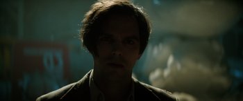 Movie still from “Renfield” (2023), directed by Chris McKay – A person wearing a jacket; Close Up shot, Low angle