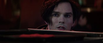 Movie still from “Renfield” (2023), directed by Chris McKay – A person with a skateboard; Close Up shot, Low angle