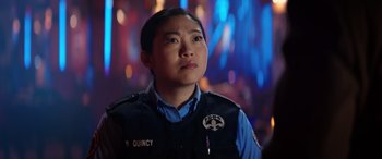 Movie still from “Renfield” (2023), directed by Chris McKay – A police officer is looking up at the sky; Close Up shot, Over the shoulder angle