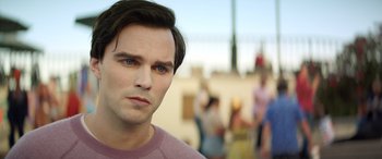 Movie still from “Renfield” (2023), directed by Chris McKay – A person wearing a pink shirt; Close Up shot, Over the shoulder angle