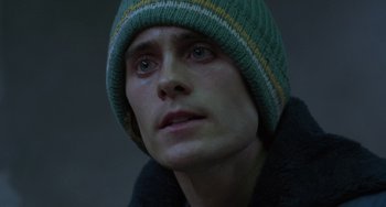 Movie still from “Requiem for a Dream” (2000), directed by Darren Aronofsky – A person wearing a hat; Close Up shot, Low angle