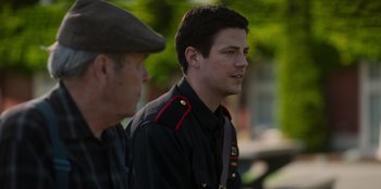 Movie still from “Rescued by Ruby” (2022), directed by Katt Shea – A man in a military uniform standing next to another man; Close Up shot, Over the shoulder angle