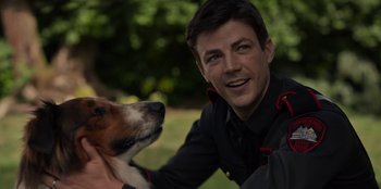 Movie still from “Rescued by Ruby” (2022), directed by Katt Shea – A man and a dog in a field; Close Up shot, Over the shoulder angle