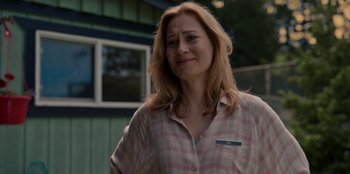 Movie still from “Rescued by Ruby” (2022), directed by Katt Shea – A person wearing a shirt; Close Up shot, Over the shoulder angle