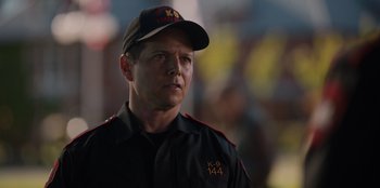 Movie still from “Rescued by Ruby” (2022), directed by Katt Shea – A person wearing a hat; Close Up shot, Over the shoulder angle