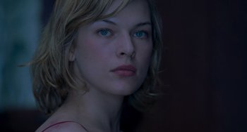 Movie still from “Resident Evil” (2002), directed by Paul W.S. Anderson – A person with blue eyes; Close Up shot, Low angle