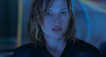 Movie still from “Resident Evil” (2002), directed by Paul W.S. Anderson – A person with wet hair; Close Up shot, Low angle