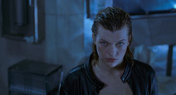 Movie still from “Resident Evil” (2002), directed by Paul W.S. Anderson – A person with wet hair; Close Up shot, Over the shoulder angle