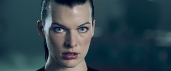 Movie still from “Resident Evil: Afterlife” (2010), directed by Paul W.S. Anderson – A woman's face with blue eyes; Close Up shot, Low angle