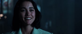 Movie still from “Resident Evil: Apocalypse” (2004), directed by Alexander Witt – A person with a smile on their face; Close Up shot, Low angle