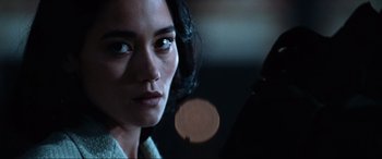 Movie still from “Resident Evil: Apocalypse” (2004), directed by Alexander Witt – A woman's face in the dark; Close Up shot, Low angle