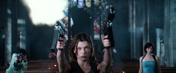 Movie still from “Resident Evil: Apocalypse” (2004), directed by Alexander Witt – Milla jovovich in a scene from resident evil : the final chapter; Medium shot, Low angle