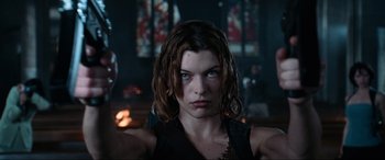 Movie still from “Resident Evil: Apocalypse” (2004), directed by Alexander Witt – Milla jovovich in resident evil : the final chapter; Close Up shot, Low angle