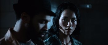 Movie still from “Resident Evil: Apocalypse” (2004), directed by Alexander Witt – A man and a woman looking at each other; Close Up shot, Over the shoulder angle