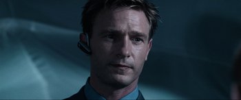 Movie still from “Resident Evil: Apocalypse” (2004), directed by Alexander Witt – A person wearing a headset; Close Up shot, Low angle