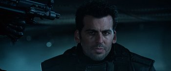 Movie still from “Resident Evil: Apocalypse” (2004), directed by Alexander Witt – A person wearing a jacket; Close Up shot, Low angle