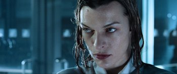 Movie still from “Resident Evil: Apocalypse” (2004), directed by Alexander Witt – A person with wet hair; Close Up shot, Low angle