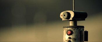 Movie still from “Resident Evil: Extinction” (2007), directed by Russell Mulcahy – A camera on top of a metal pole; Extreme Close Up shot, Low angle