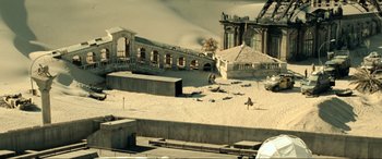 Movie still from “Resident Evil: Extinction” (2007), directed by Russell Mulcahy – An image of an abandoned building in the desert; Extreme Wide shot, High angle