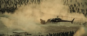 Movie still from “Resident Evil: Extinction” (2007), directed by Russell Mulcahy – A helicopter is flying over a body of water; Extreme Wide shot, High angle