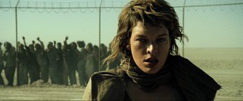 Movie still from “Resident Evil: Extinction” (2007), directed by Russell Mulcahy – Milla jovovich in a scene from resident evil : the final chapter; Close Up shot, Low angle