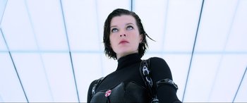 Movie still from “Resident Evil: Retribution” (2012), directed by Paul W.S. Anderson – A person wearing a wetsuit; Close Up shot, Low angle