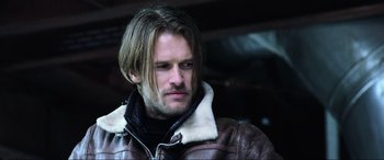 Movie still from “Resident Evil: Retribution” (2012), directed by Paul W.S. Anderson – A person with long hair; Close Up shot, Low angle