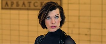 Movie still from “Resident Evil: Retribution” (2012), directed by Paul W.S. Anderson – A person with short brown hair; Close Up shot, Low angle