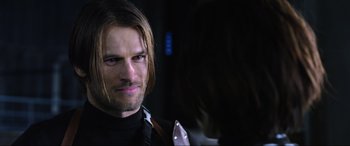 Movie still from “Resident Evil: Retribution” (2012), directed by Paul W.S. Anderson – A person with long hair; Close Up shot, Over the shoulder angle