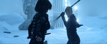 Movie still from “Resident Evil: Retribution” (2012), directed by Paul W.S. Anderson – Two people are fighting in the snow; Medium shot, Over the shoulder angle