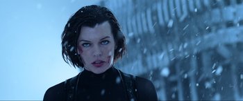 Movie still from “Resident Evil: Retribution” (2012), directed by Paul W.S. Anderson – A person with a bloody face; Close Up shot, Low angle