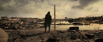 Movie still from “Resident Evil: The Final Chapter” (2016), directed by Paul W.S. Anderson – A person standing in front of a body of water; Extreme Wide shot, Low angle