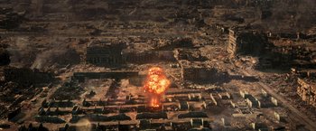 Movie still from “Resident Evil: The Final Chapter” (2016), directed by Paul W.S. Anderson – An aerial view of an explosion in the middle of a city; Extreme Wide shot, High angle