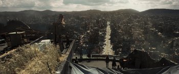 Movie still from “Resident Evil: The Final Chapter” (2016), directed by Paul W.S. Anderson – People are standing on the edge of a building; Extreme Wide shot, High angle