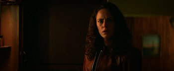 Movie still from “Resident Evil: Welcome to Raccoon City” (2021), directed by Johannes Roberts – A person wearing a leather jacket; Close Up shot, Low angle