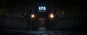 Movie still from “Resident Evil: Welcome to Raccoon City” (2021), directed by Johannes Roberts – The entrance to the r; Extreme Wide shot, High angle