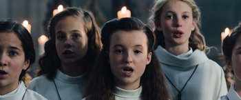 Movie still from “Resistance” (2020), directed by Jonathan Jakubowicz – A group of young girls standing next to each other; Close Up shot, Over the shoulder angle