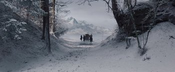 Movie still from “Resistance” (2020), directed by Jonathan Jakubowicz – A group of people standing on top of a snow covered slope; Extreme Wide shot, High angle
