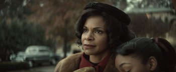 Movie still from “Respect” (2021), directed by Liesl Tommy – An older woman wearing a fur coat; Close Up shot, Over the shoulder angle