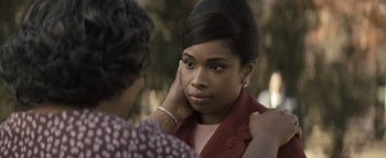 Movie still from “Respect” (2021), directed by Liesl Tommy – A young woman is looking at another woman's face; Close Up shot, Over the shoulder angle