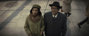 Movie still from “Respect” (2021), directed by Liesl Tommy – A man and a woman standing next to each other; Medium shot, High angle